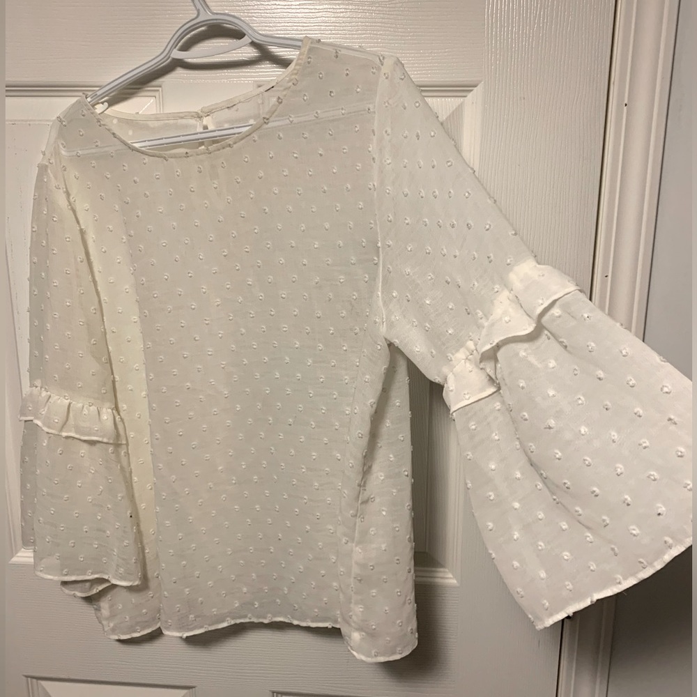 Bell sleeved top